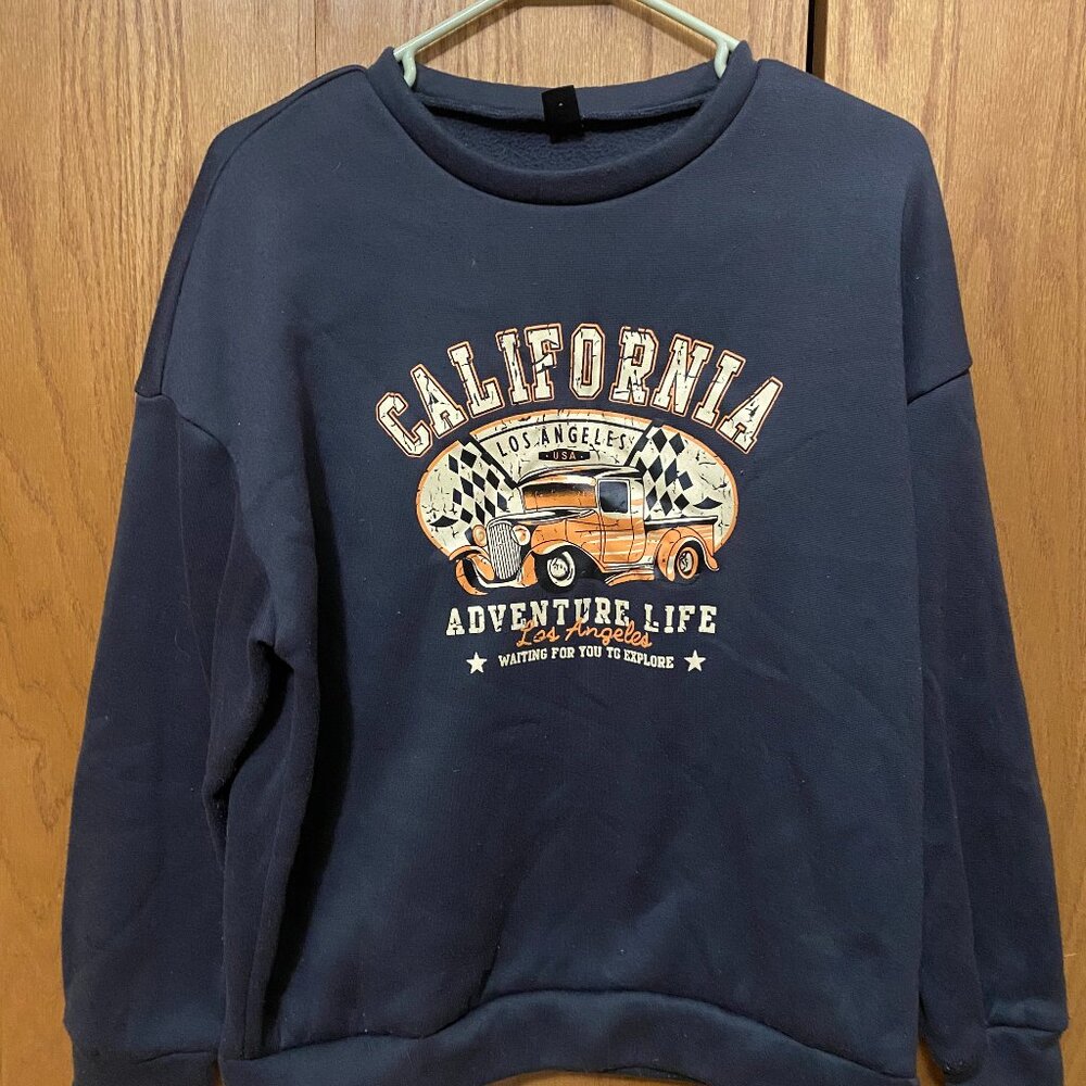 Dark grey crew neck with orange truck "California"